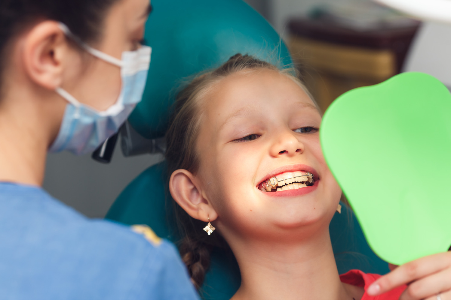 Child with orthodontic appliances at an orthodontic office in Crestview Hills KY
